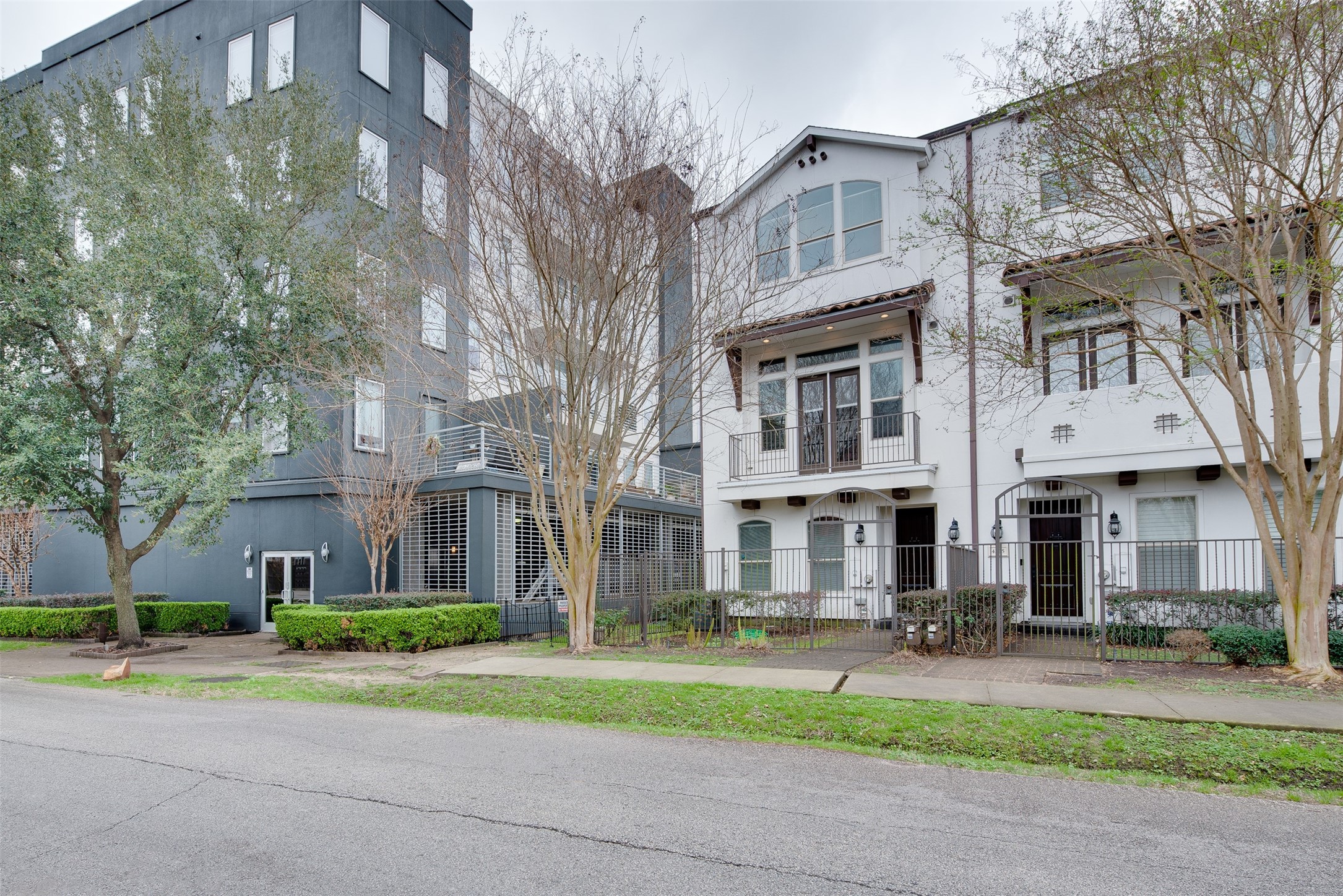 4203 Feagan Street Houston, TX 77007 - Photo 2 of 36 a view of a large building next to a yard