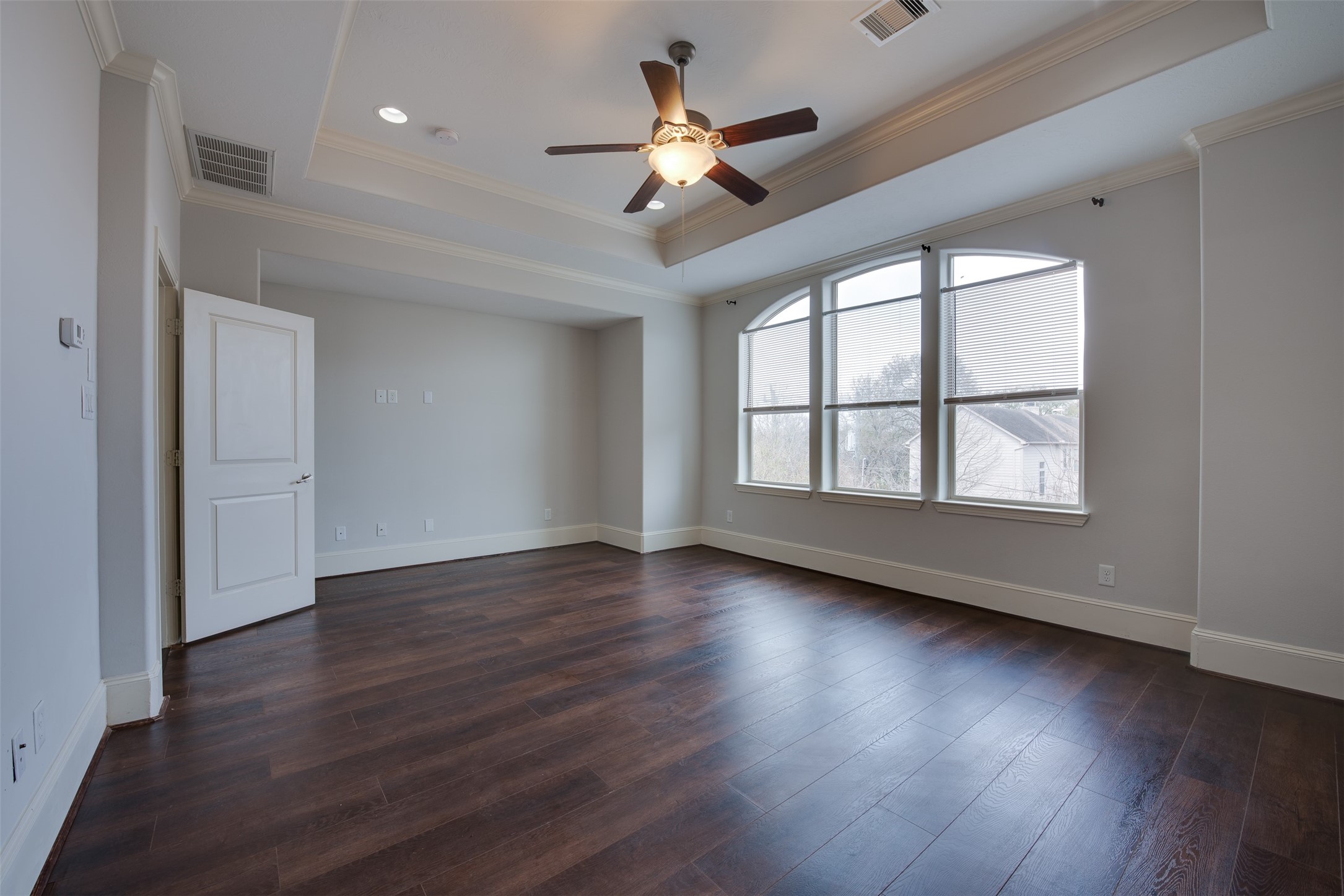 4203 Feagan Street Houston, TX 77007 - Photo 31 of 36 a view of an empty room with wooden floor and a window