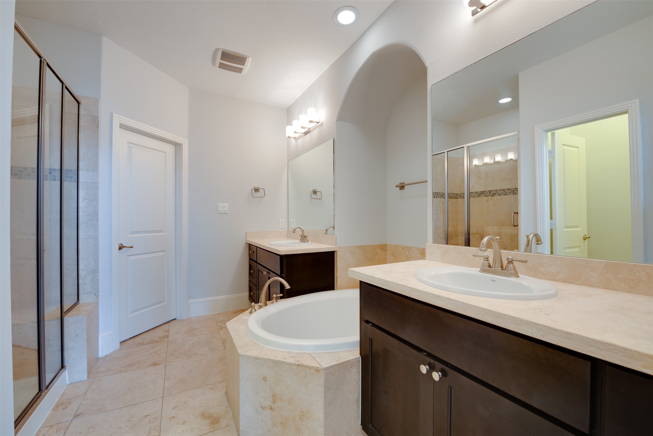 4203 Feagan Street Houston, TX 77007 - Photo 33 of 36 a bathroom with a sink a toilet and a mirror