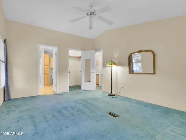 a bathroom with a sink vanity and a mirror
