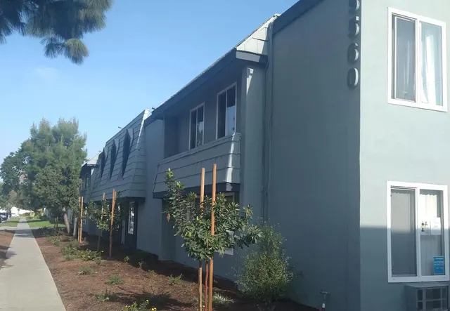 a brick building with a large windows