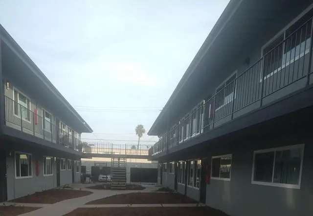 a view of city with tall buildings