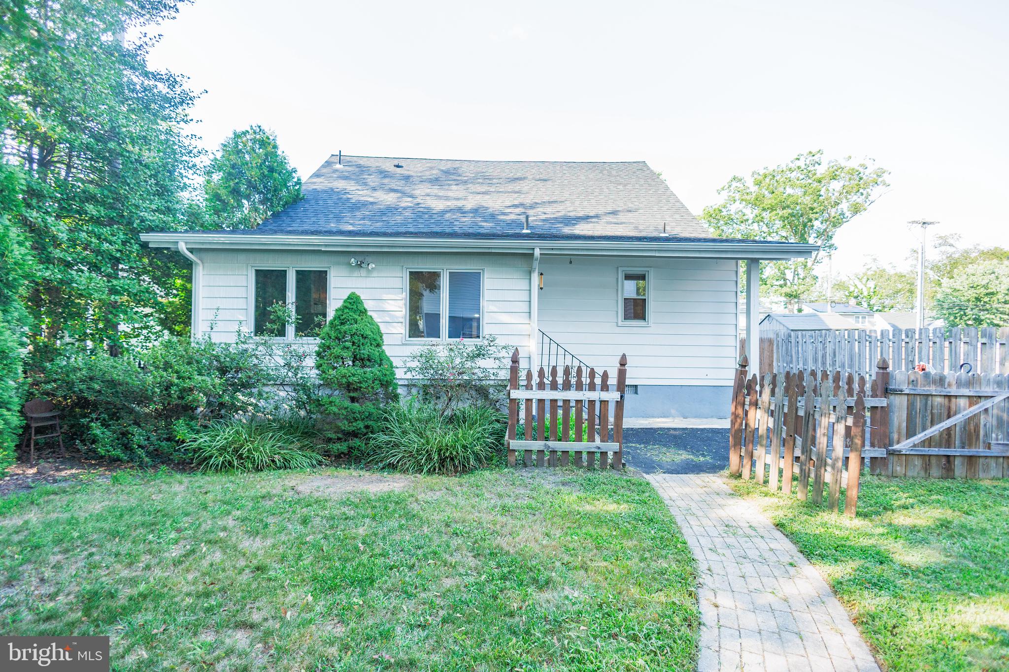 210 Deptford Road Glassboro, NJ 08028 - Photo 2 of 25 a front view of a house with garden