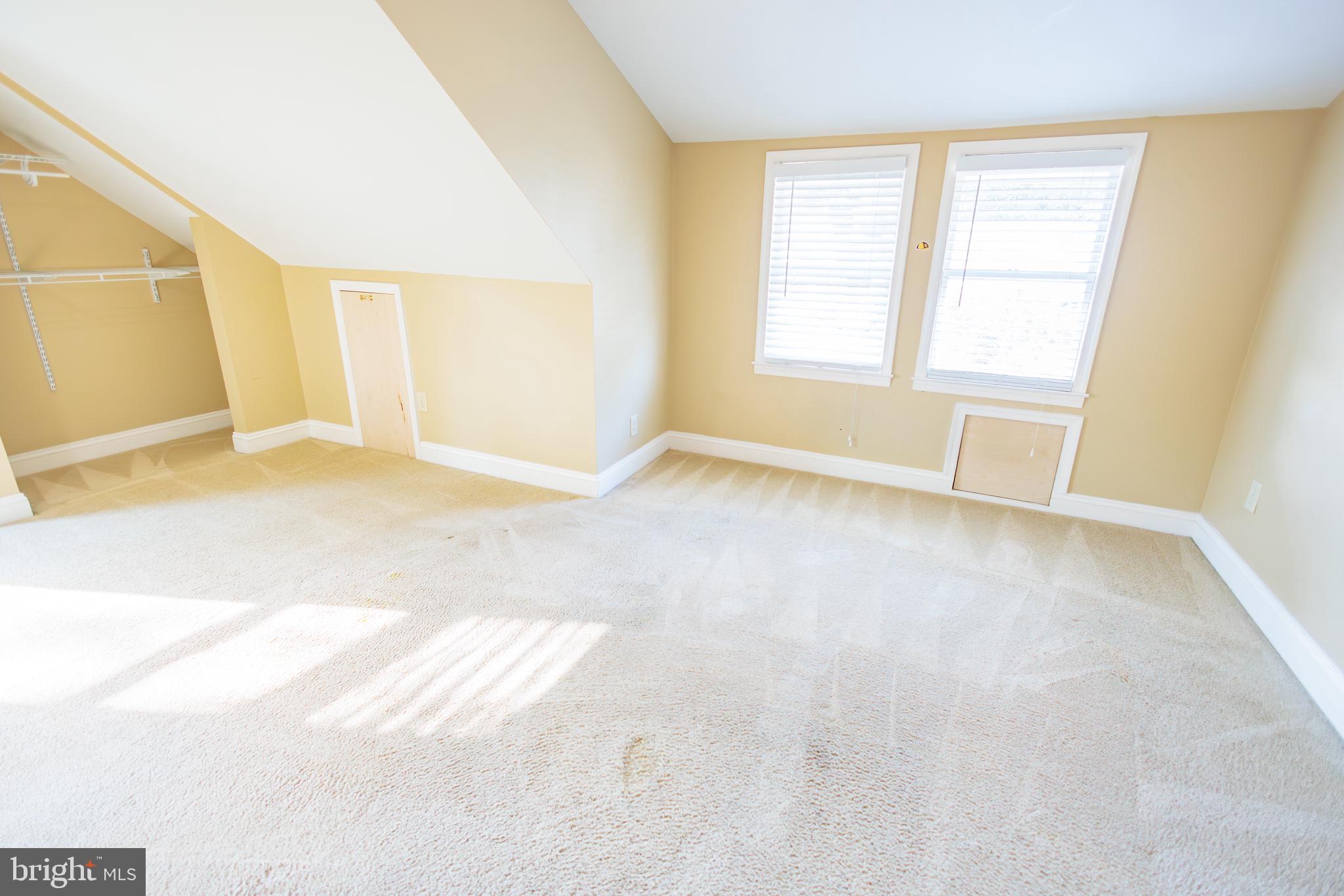 210 Deptford Road Glassboro, NJ 08028 - Photo 21 of 25 a view of an empty room with a window