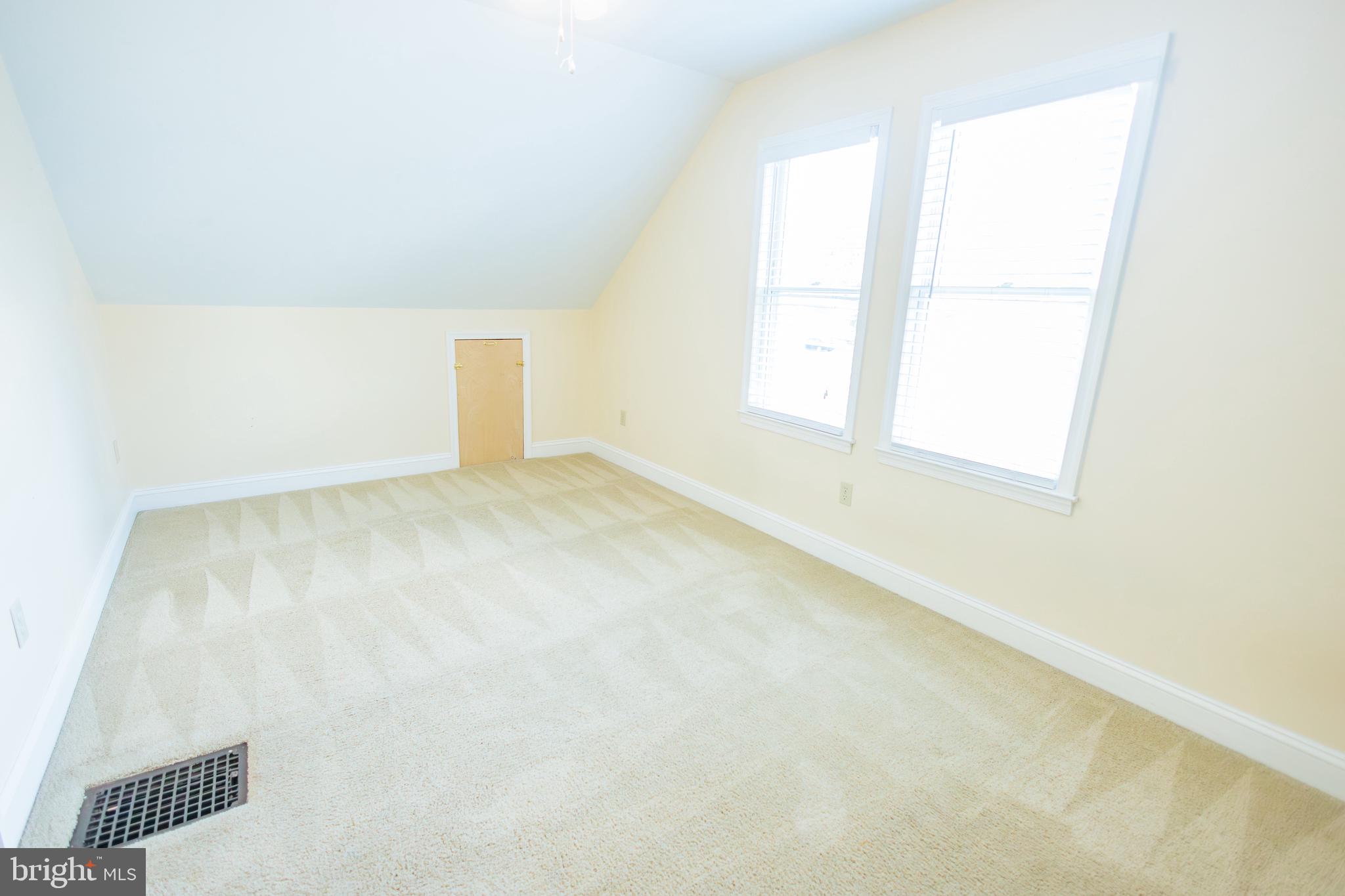 210 Deptford Road Glassboro, NJ 08028 - Photo 23 of 25 an empty room with a window