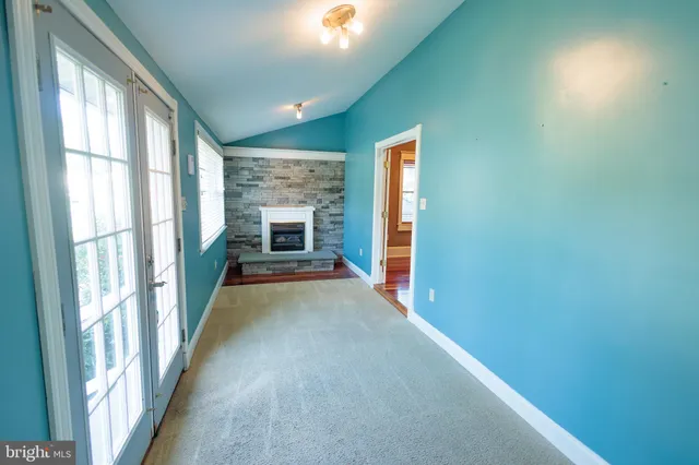 a view of hallway with windows