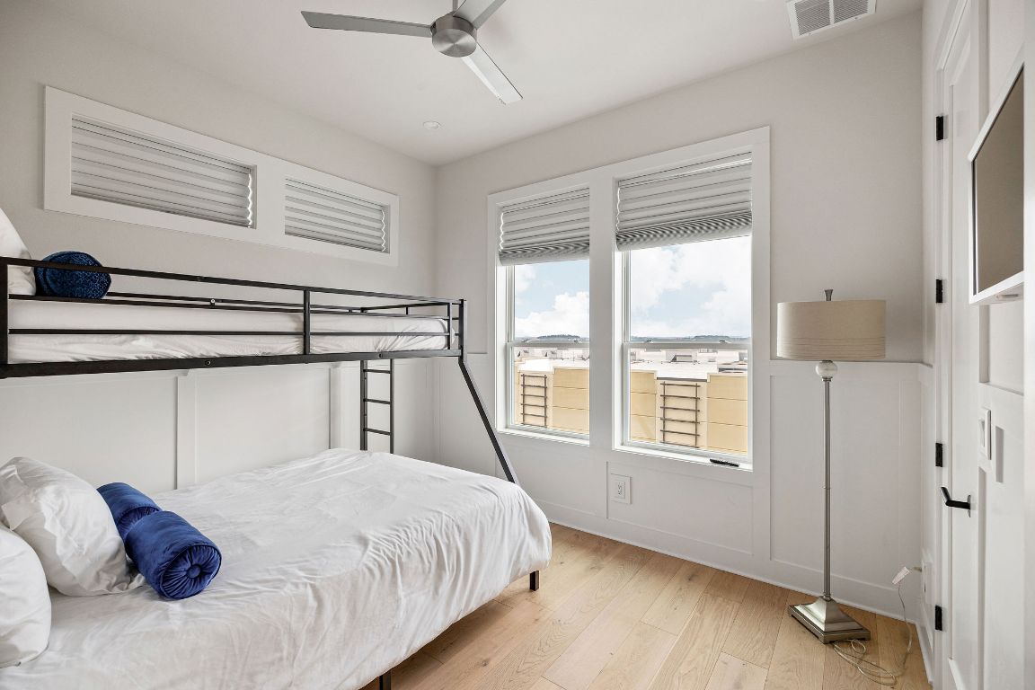 13410 Galleria Circle Austin, TX 78738 - Photo 14 of 28 a bedroom with a large bed and a window