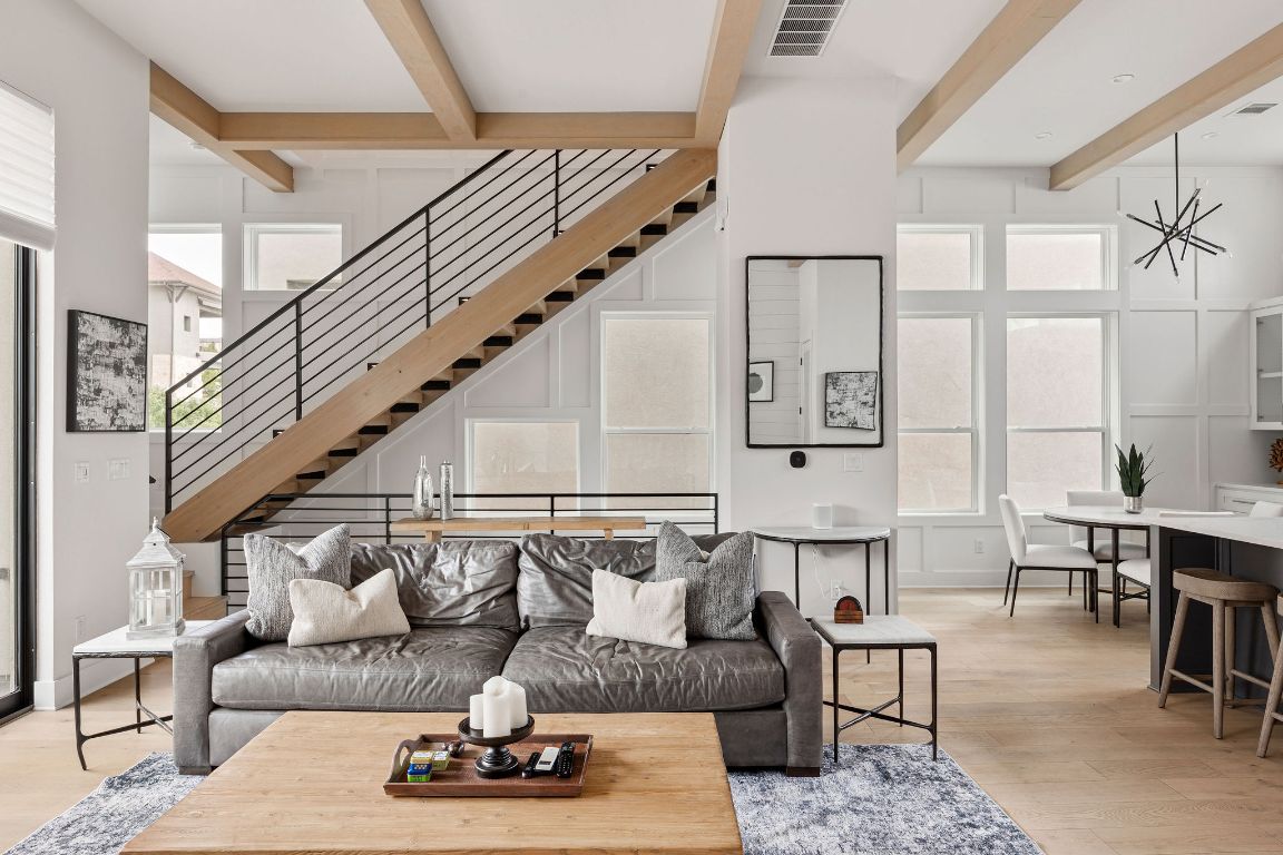 13410 Galleria Circle Austin, TX 78738 - Photo 18 of 28 a living room with furniture and wooden floor