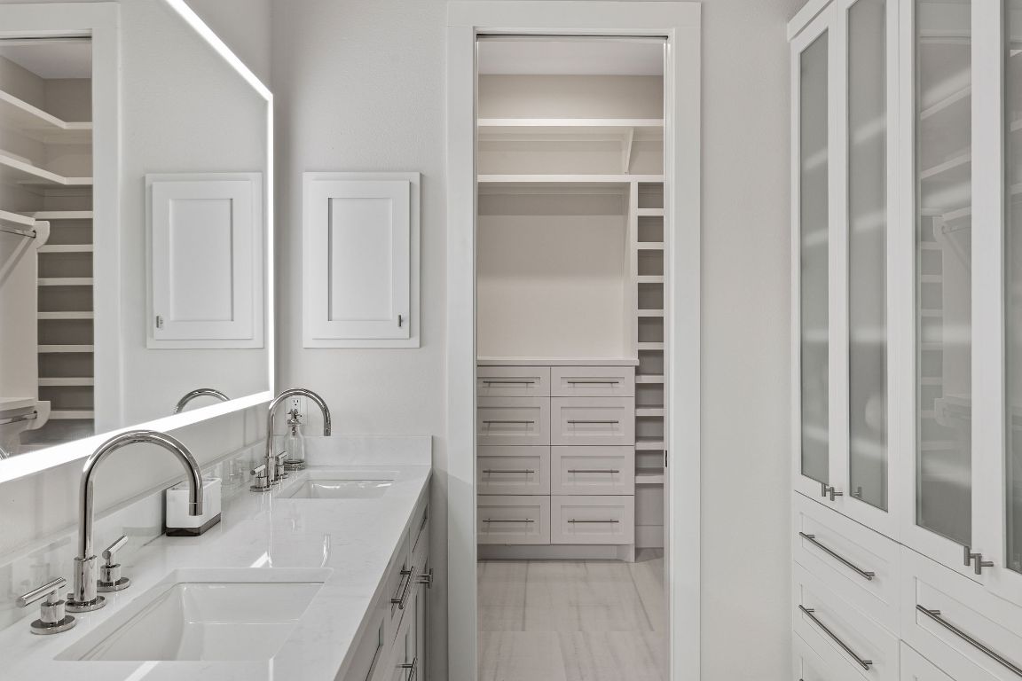 13410 Galleria Circle Austin, TX 78738 - Photo 8 of 28 a bathroom with a sink and a mirror