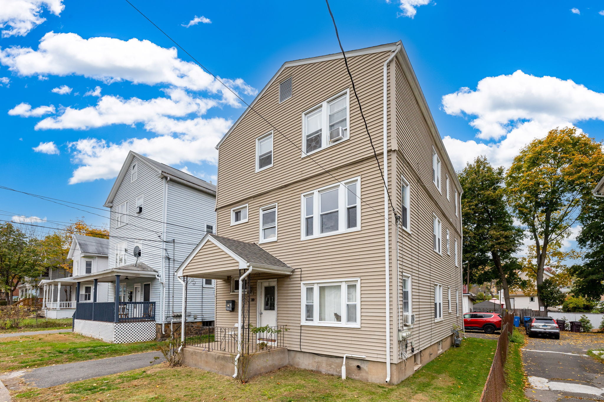 80 Belden Street, Unit 2 New Britain, CT 06051 - Photo 13 of 15 a front view of a house with garden