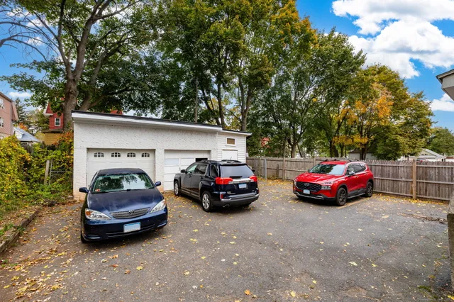 a car parked in front of a house