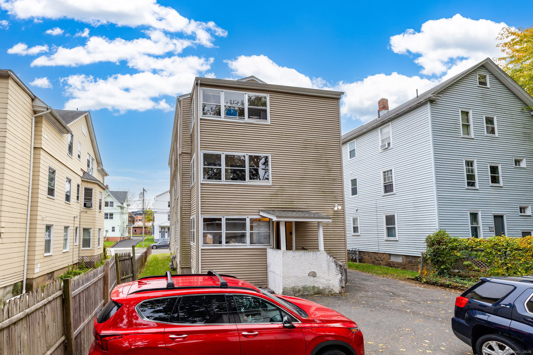 80 Belden Street, Unit 2 New Britain, CT 06051 - Photo 15 of 15 a couple of cars parked in front of a house