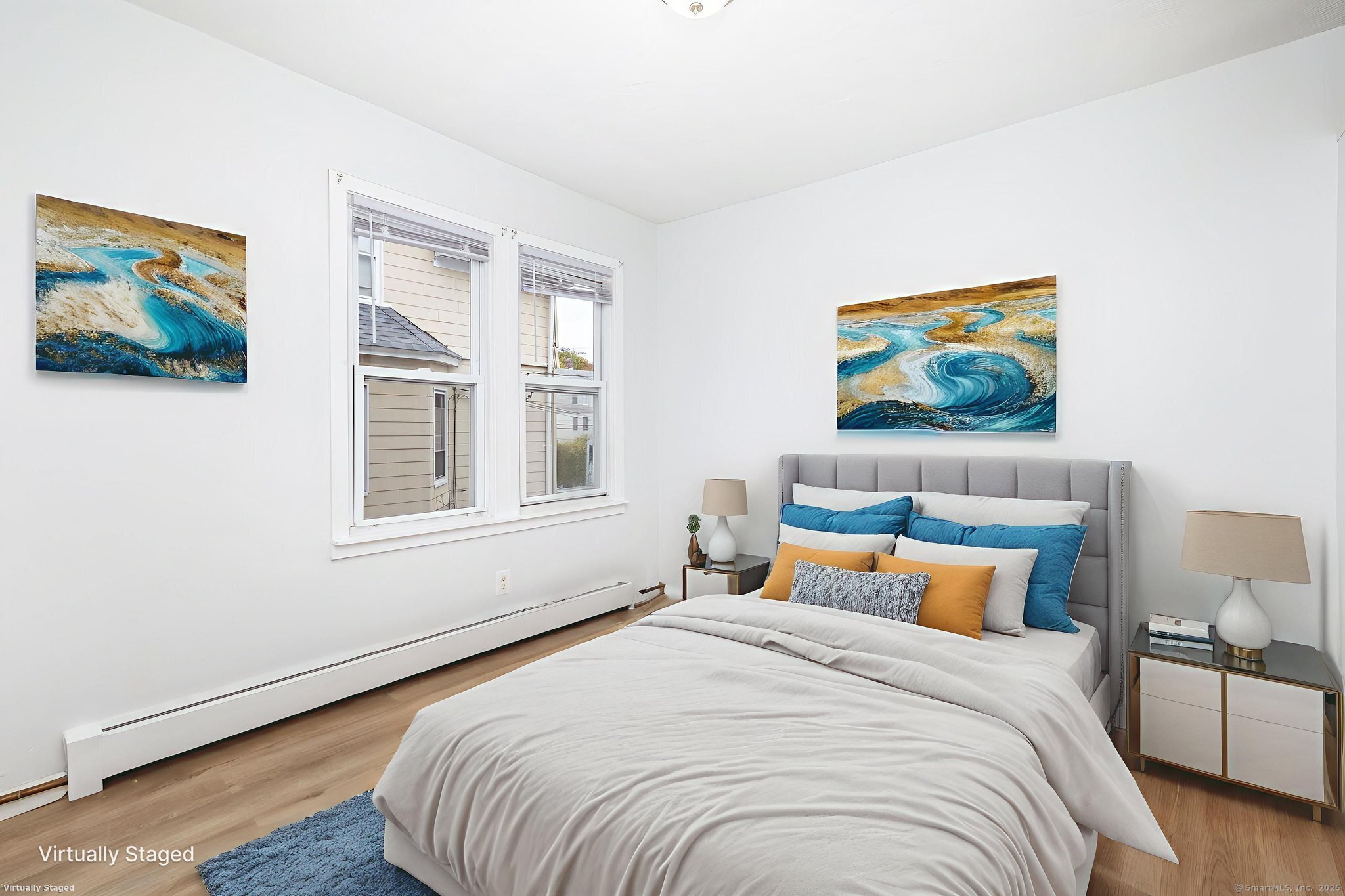 80 Belden Street, Unit 2 New Britain, CT 06051 - Photo 6 of 15 a bedroom with bed and wall painting with wooden floor