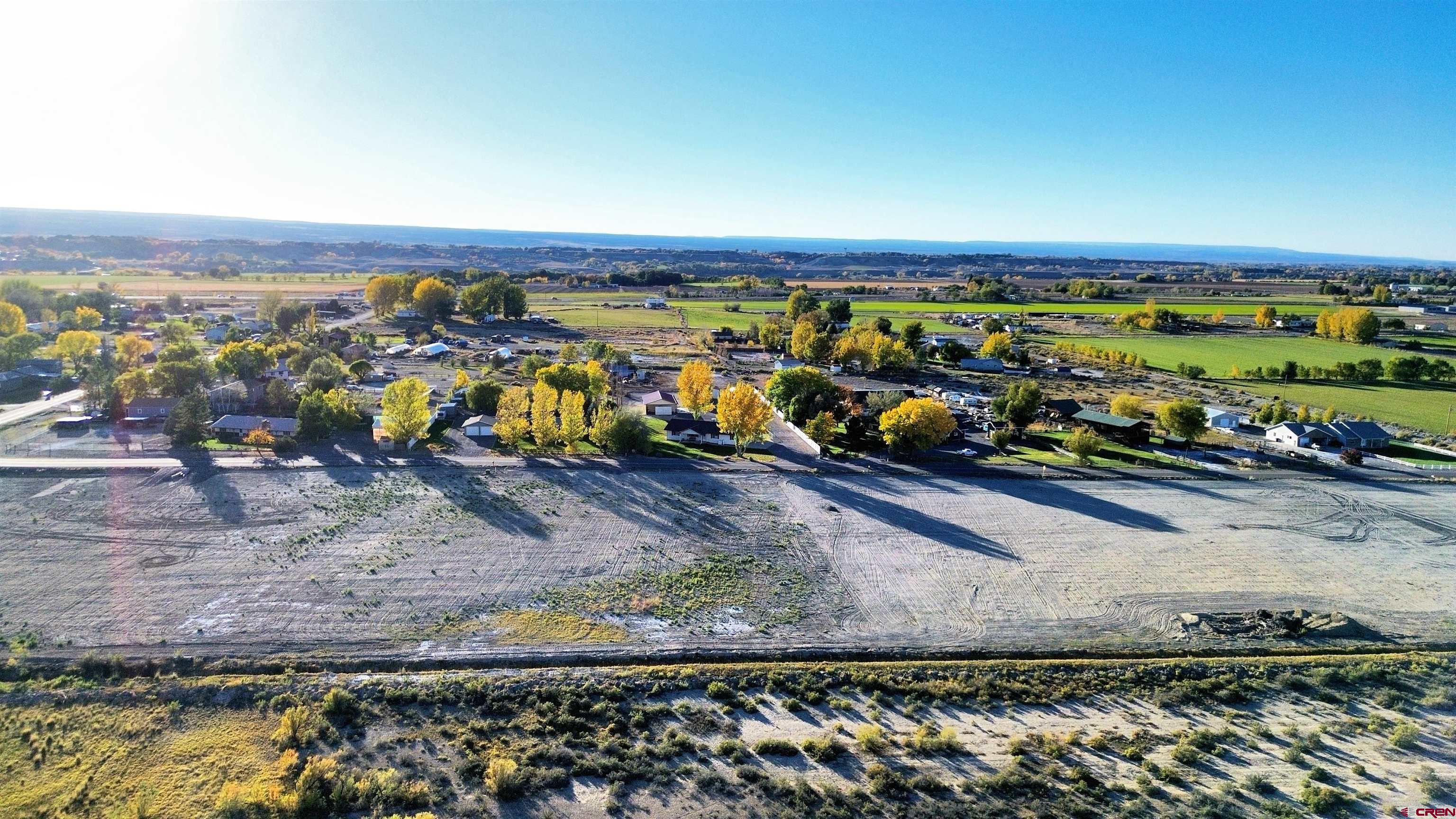 Tbd (lot 3 Gunnison Road Montrose, CO 81401 - Photo 3 of 8 an aerial view of a yard with wooden fence
