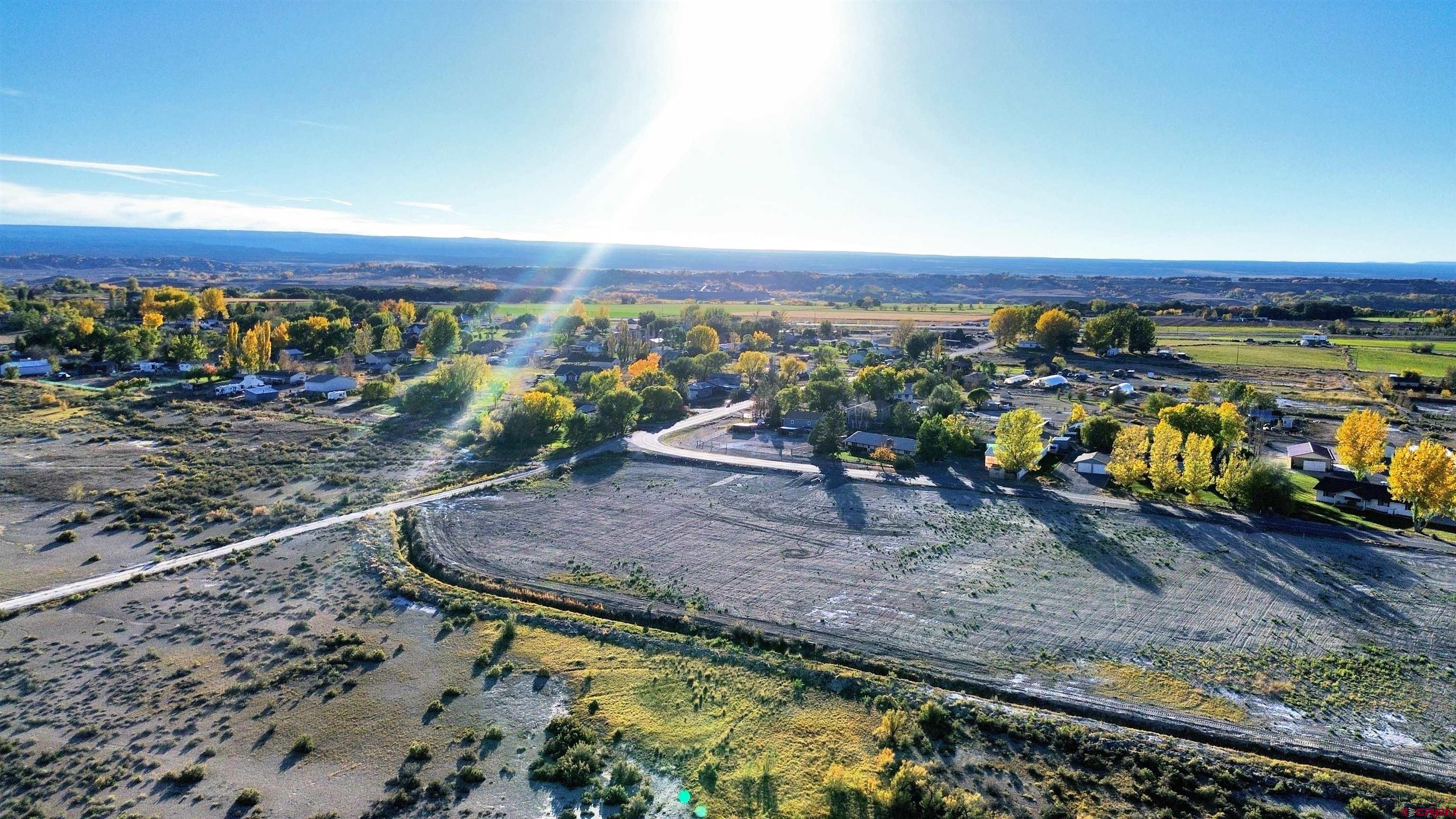 Tbd (lot 3 Gunnison Road Montrose, CO 81401 - Photo 7 of 8 a view of a yard with an outdoor space