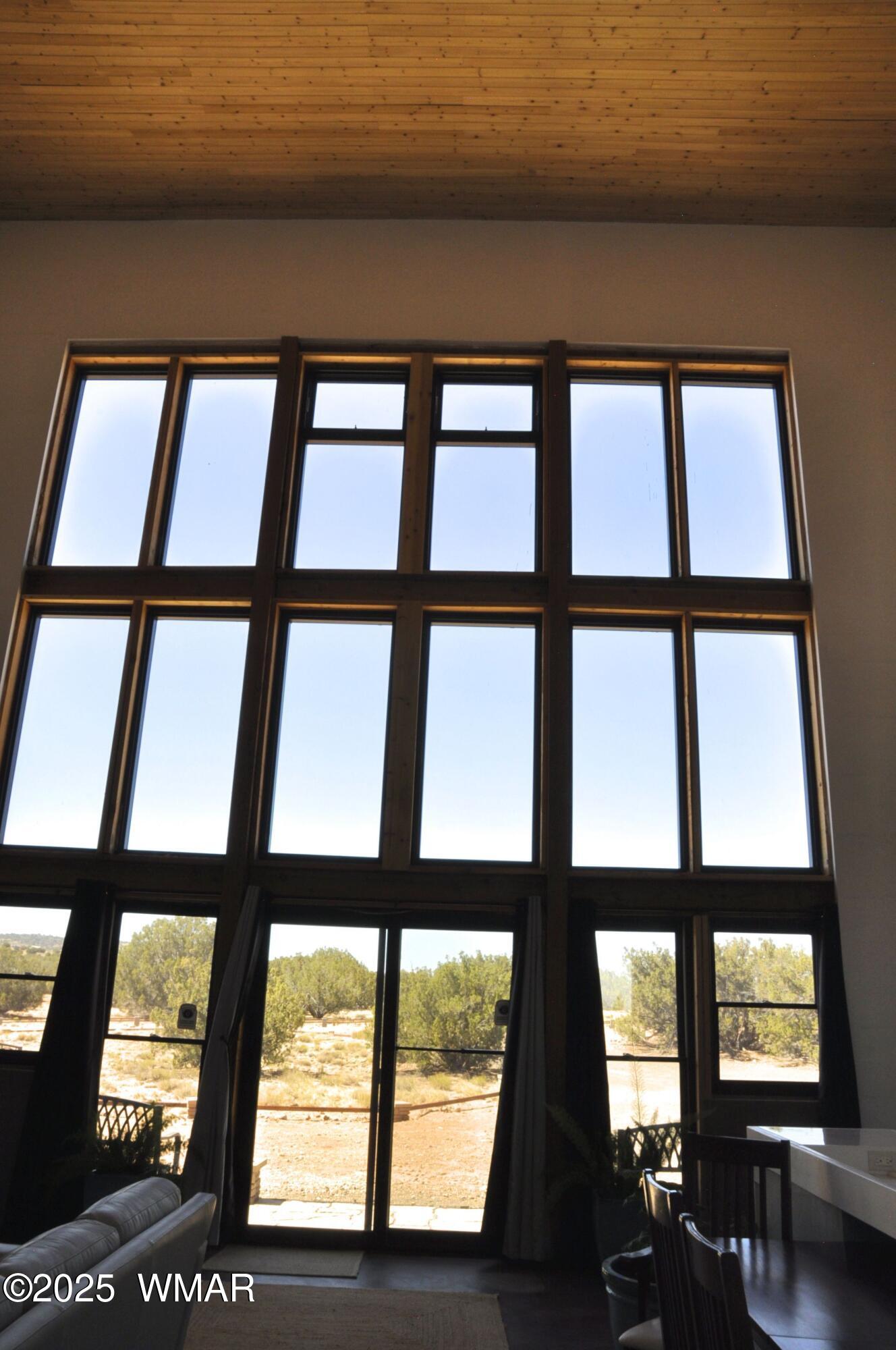 12 County Road Concho, AZ 85924 - Photo 12 of 85 30? High Window Wall to Frame Breathtaking Sky Scenes and Vast Starry Skies