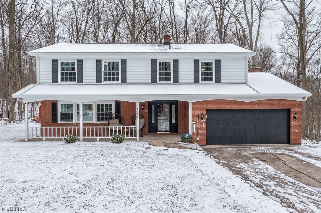 682 Center Road Hinckley, OH 44233 - Photo 1 of 43 View of front property with a garage and a
front porch