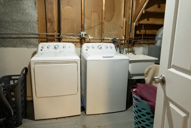 a utility room with dryer and washer