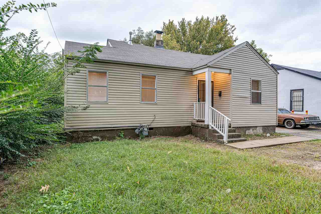 1023 Parkland Road Memphis, TN 38111 - Photo 3 of 22 a view of a house with a yard and sitting area
