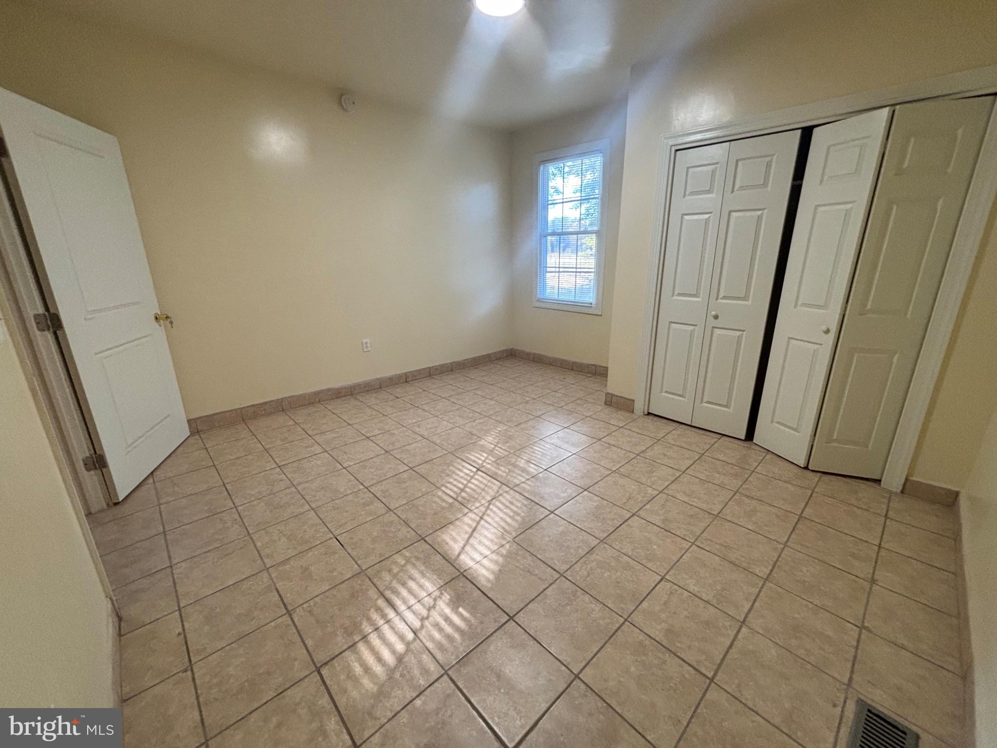 141 Arneys Mt Road Pemberton, NJ 08068 - Photo 12 of 27 an empty room with windows