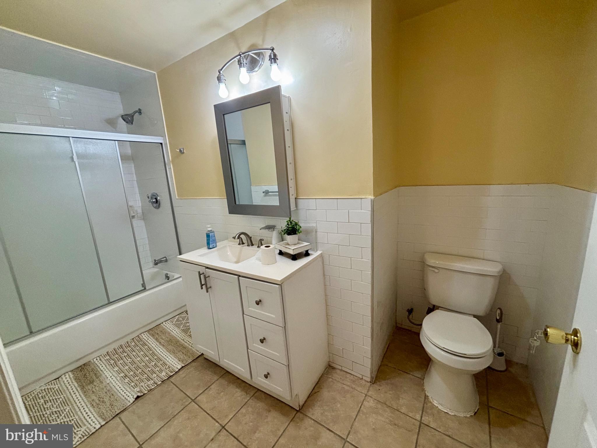 141 Arneys Mt Road Pemberton, NJ 08068 - Photo 24 of 27 a bathroom with a sink mirror vanity and toilet