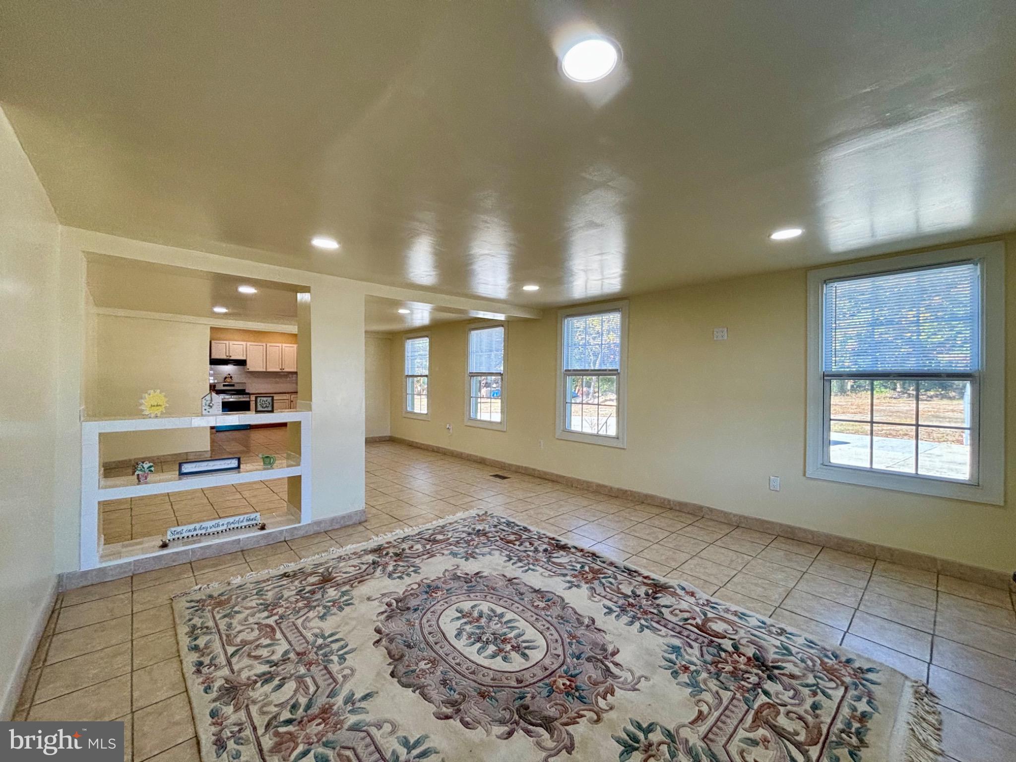 141 Arneys Mt Road Pemberton, NJ 08068 - Photo 4 of 27 a view of a big room with windows and closet