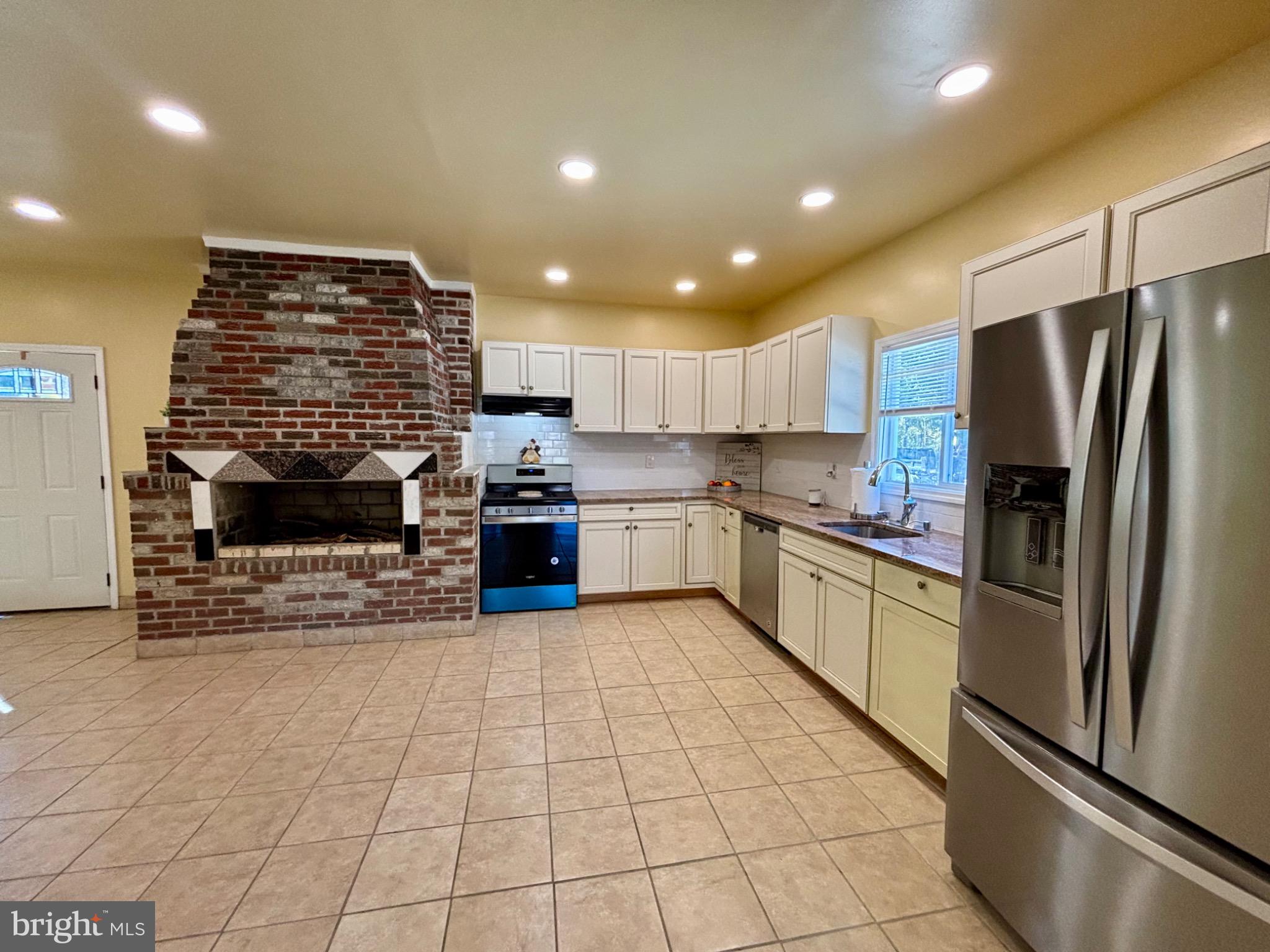 141 Arneys Mt Road Pemberton, NJ 08068 - Photo 7 of 27 a kitchen with stainless steel appliances granite countertop a refrigerator and a stove top oven