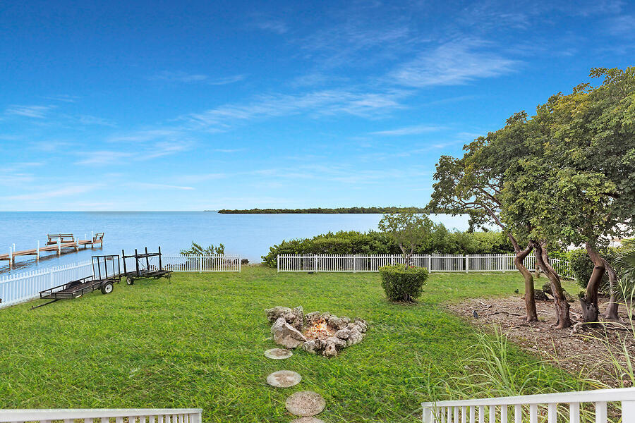 351 Stirrup Key Boulevard Marathon, FL 33050 - Photo 4 of 21 a view of a lake with a big yard