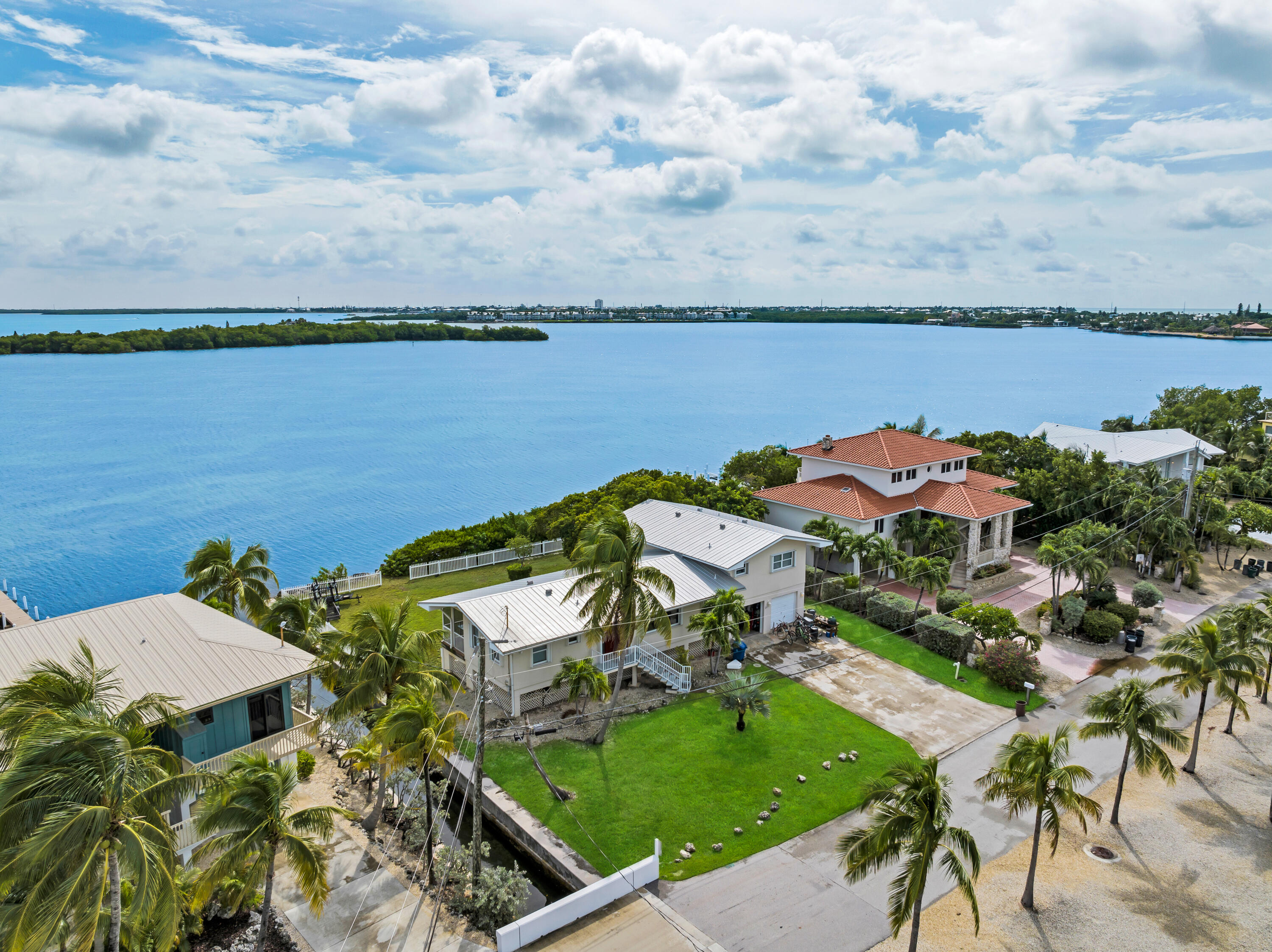 351 Stirrup Key Boulevard Marathon, FL 33050 - Photo 6 of 21 an aerial view of a house with a lake view