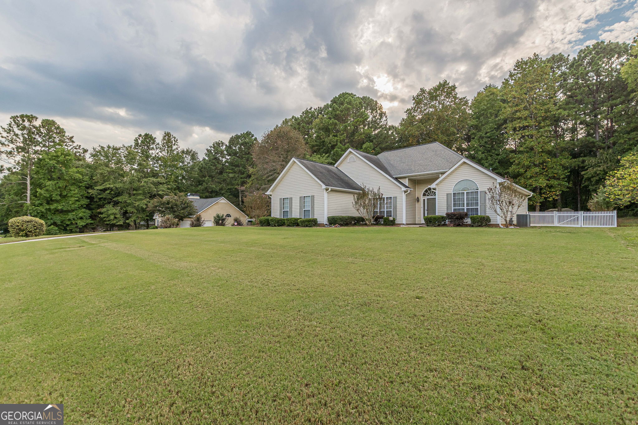 50 Riverside Walk Sharpsburg, GA 30277 - Photo 1 of 1 a view of house that has a big yard