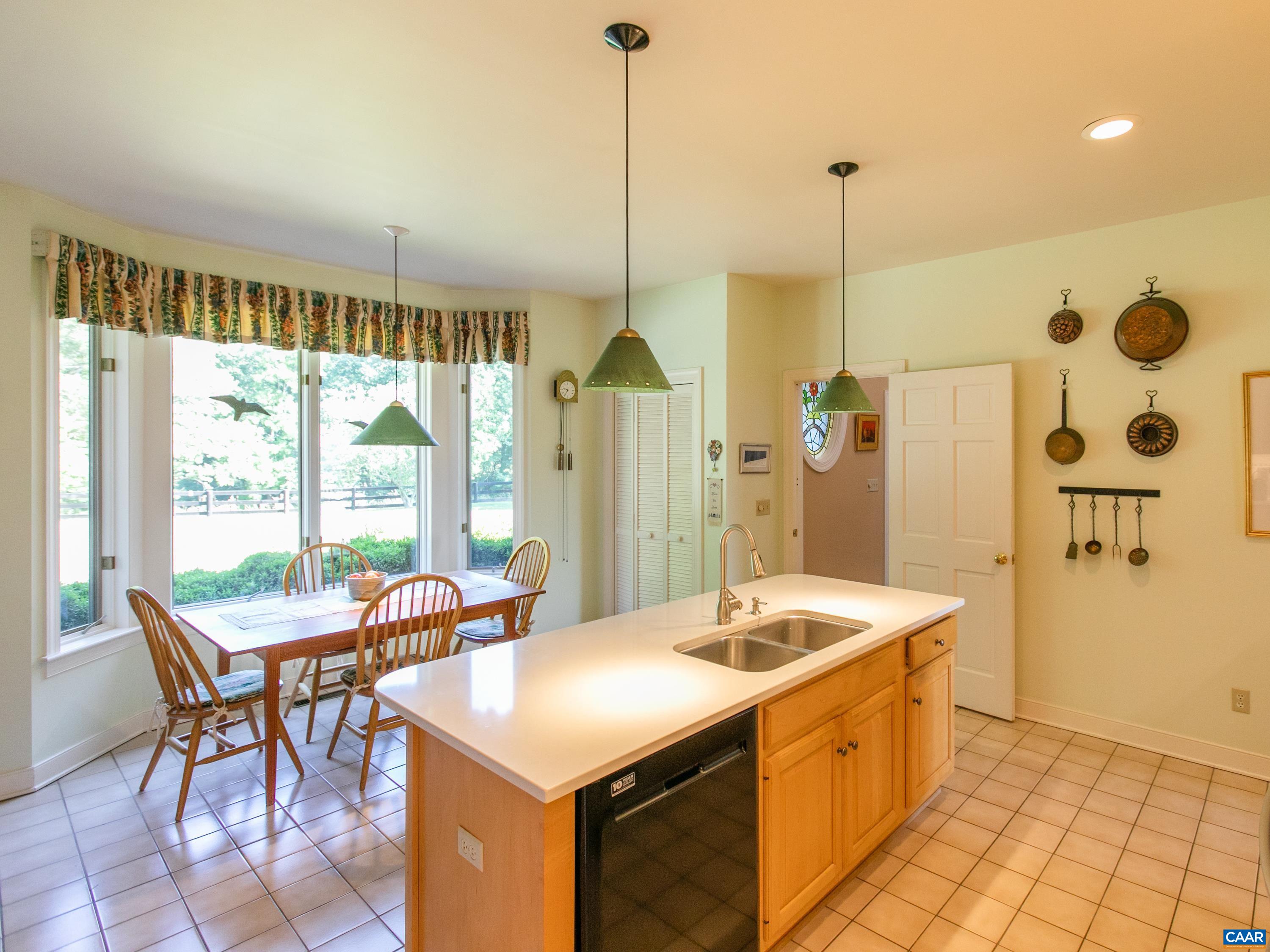 5083 Catterton Road Free Union, VA 22940 - Photo 22 of 33 a room with a table chairs and utility view