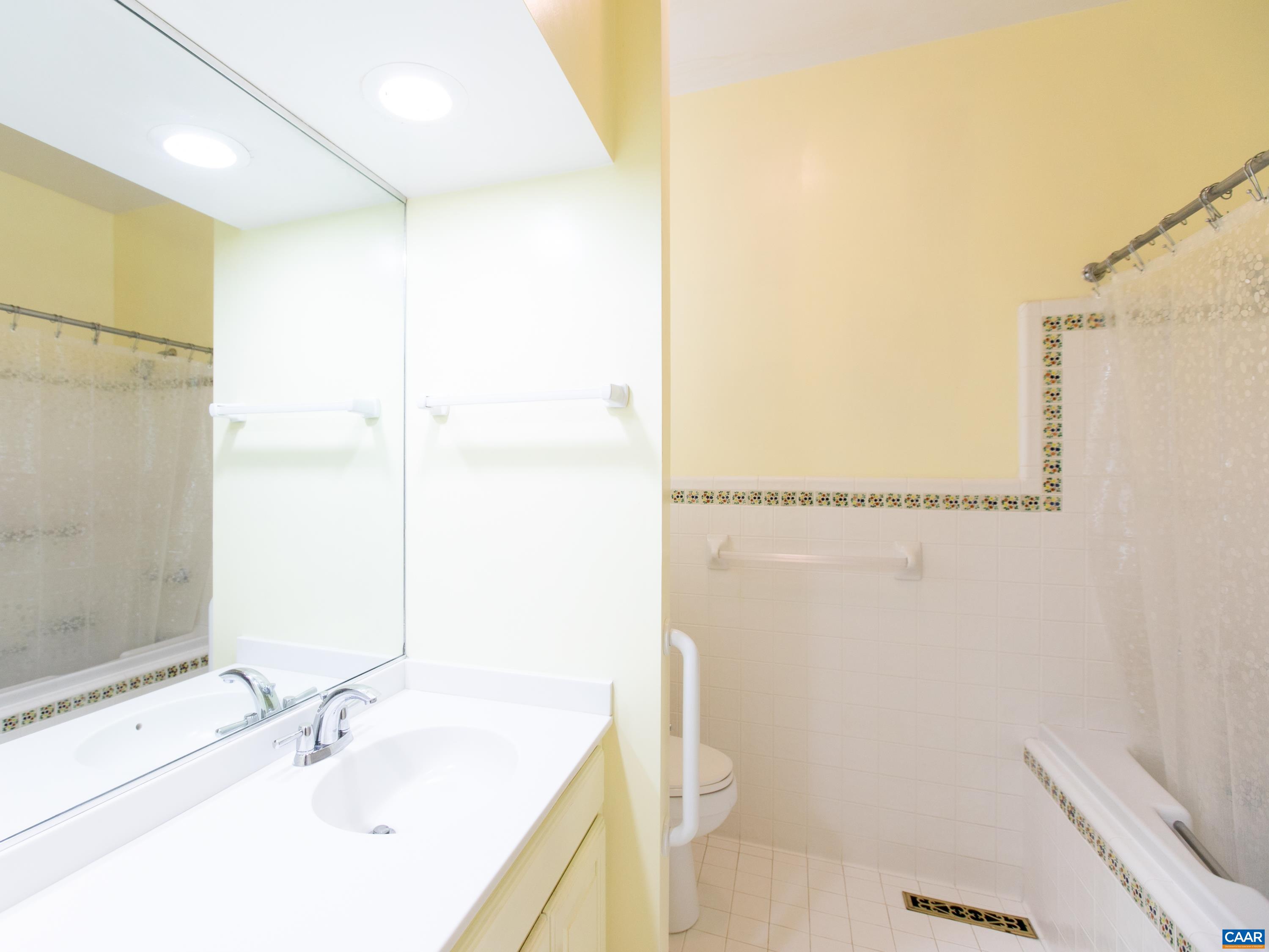 5083 Catterton Road Free Union, VA 22940 - Photo 25 of 33 a bathroom with a sink and a mirror