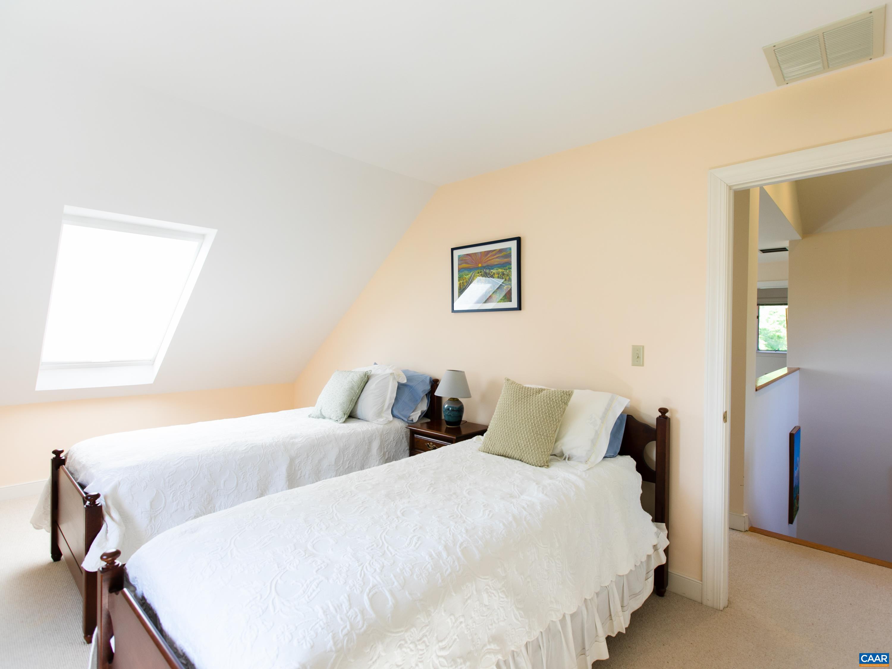 5083 Catterton Road Free Union, VA 22940 - Photo 28 of 33 a bedroom with two beds and painting on the wall