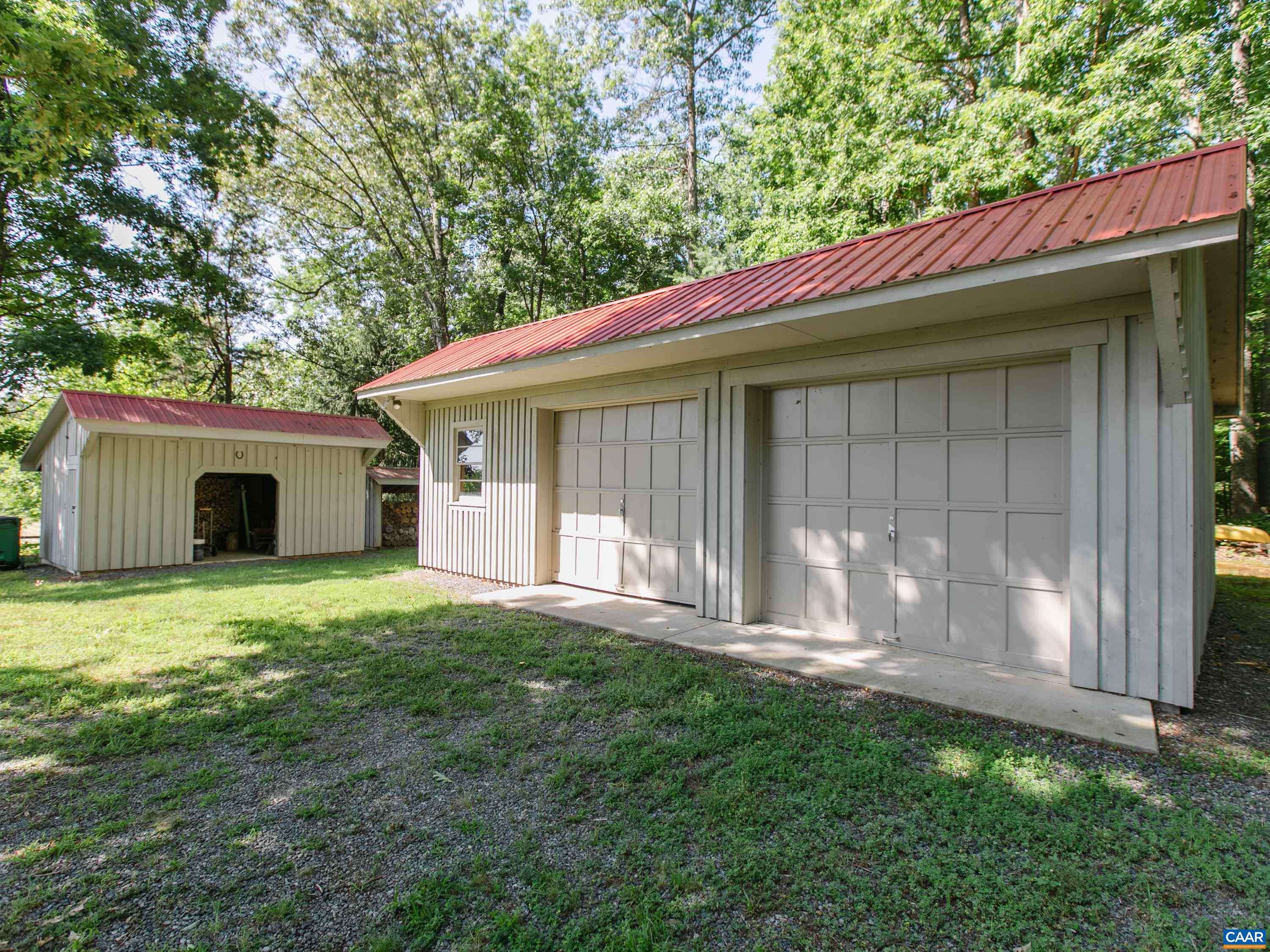 5083 Catterton Road Free Union, VA 22940 - Photo 33 of 33 a backyard of a house with table and chairs