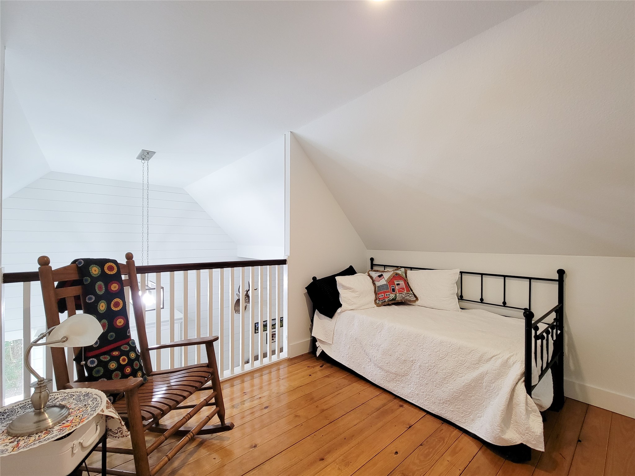 4937 Wolff Road Round Top, TX 78954 - Photo 22 of 31 Upper-level loft with elegant hardwood floors.