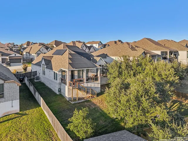 a view of a house with roof deck and balcony