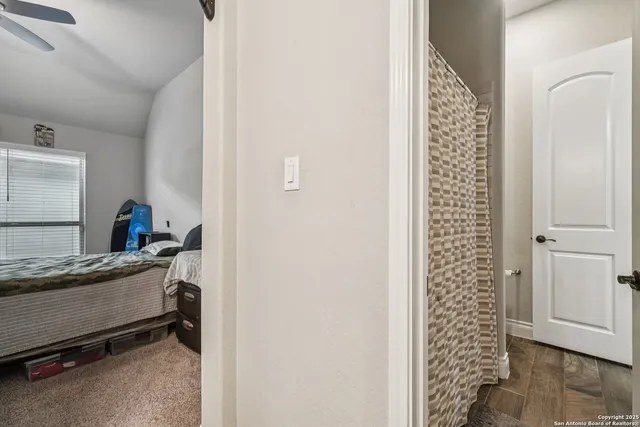 a view of room with a table and a chair