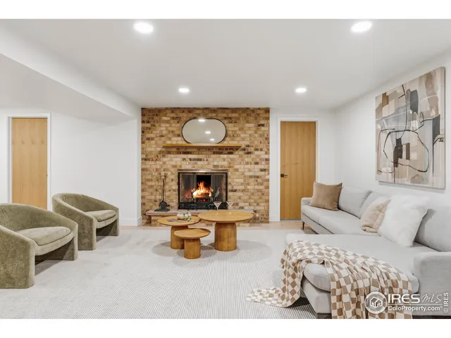 a living room with furniture and a table