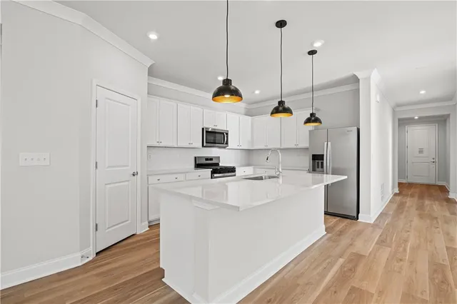 a bathroom with a sink a toilet and a bathtub