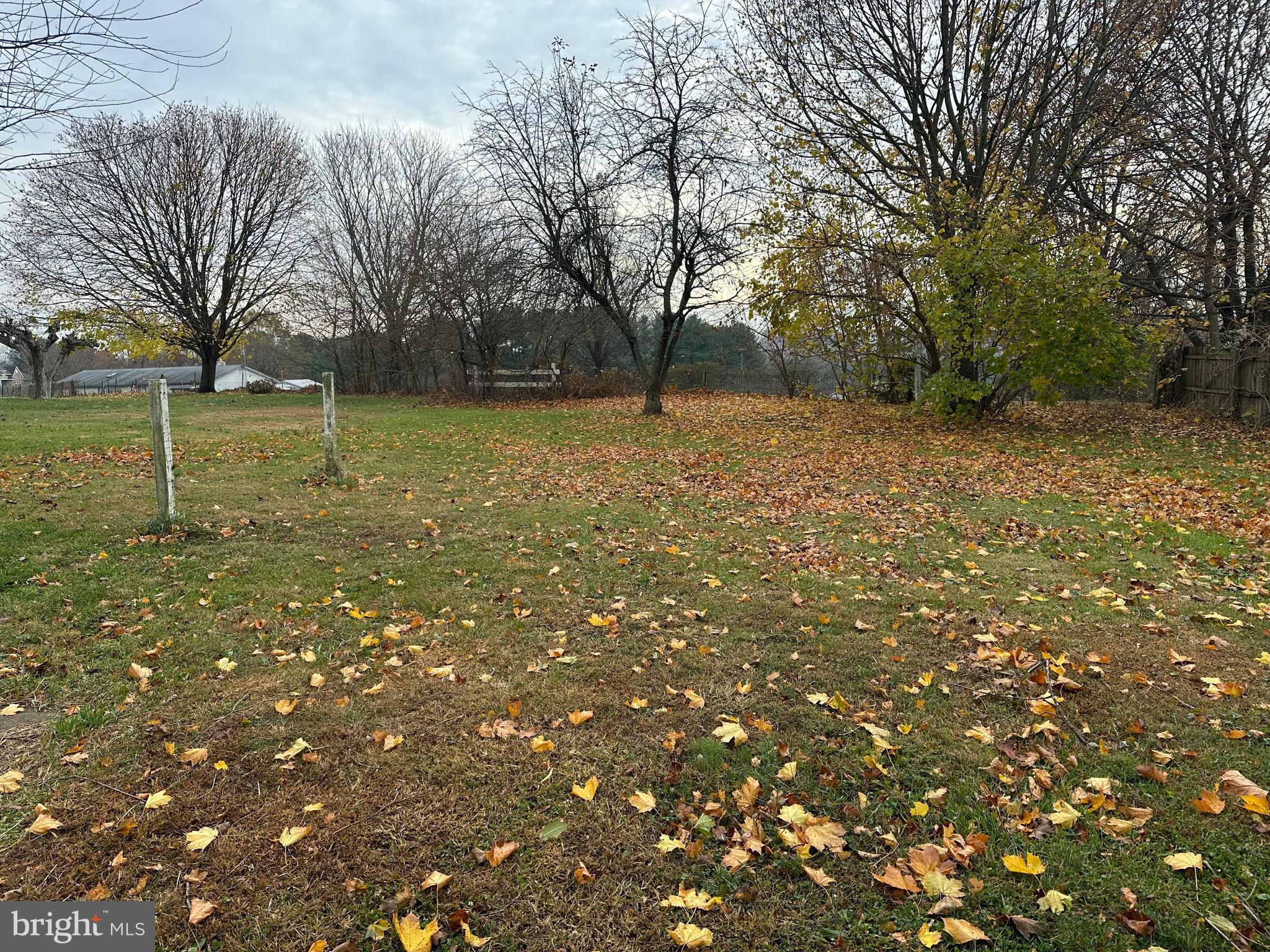 4847 Homeville Road Cochranville, PA 19330 - Photo 36 of 36 a backyard of a house with lots of green space