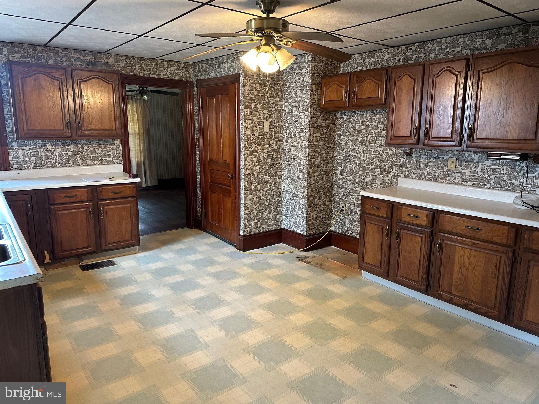 4847 Homeville Road Cochranville, PA 19330 - Photo 4 of 36 a large kitchen with cabinets and stainless steel appliances
