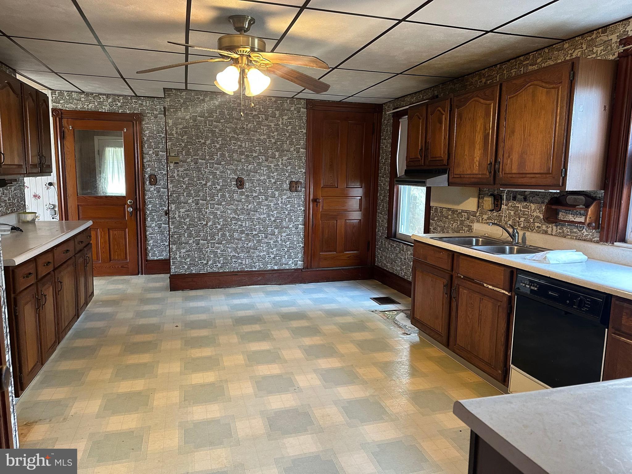 4847 Homeville Road Cochranville, PA 19330 - Photo 5 of 36 a view of a kitchen with a sink and cabinets