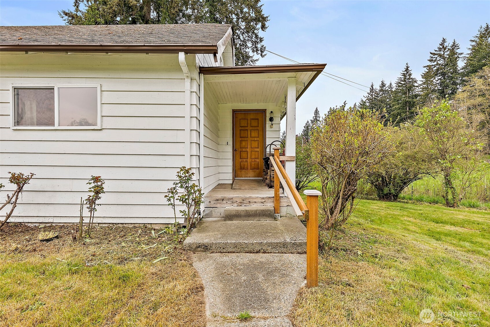 12106 County Line Road East Edgewood, WA 98372 - Photo 2 of 31 a view of house with ocean view