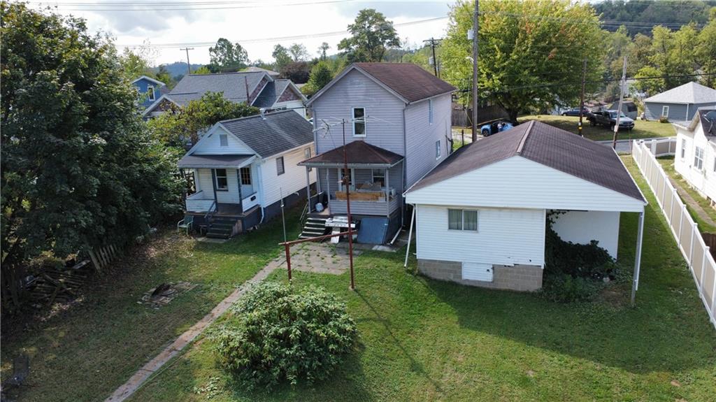 932 5th Street Charleroi, PA 15022 - Photo 5 of 26 a aerial view of a house with a yard patio and furniture