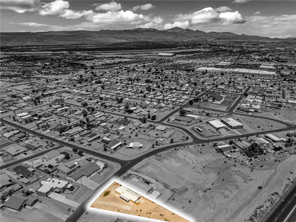 3880 Rising Sun Road Bullhead City, AZ 86442 - Photo 36 of 42 Aerial perspective showcasing a desert landscape with residential and commercial structures