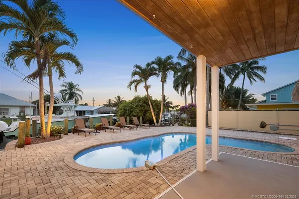 a view of outdoor space with swimming pool