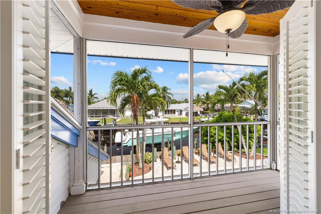 1359 Southwest Dyer Point Road Palm City, FL 34990 - Photo 23 of 55 a view of balcony with tree