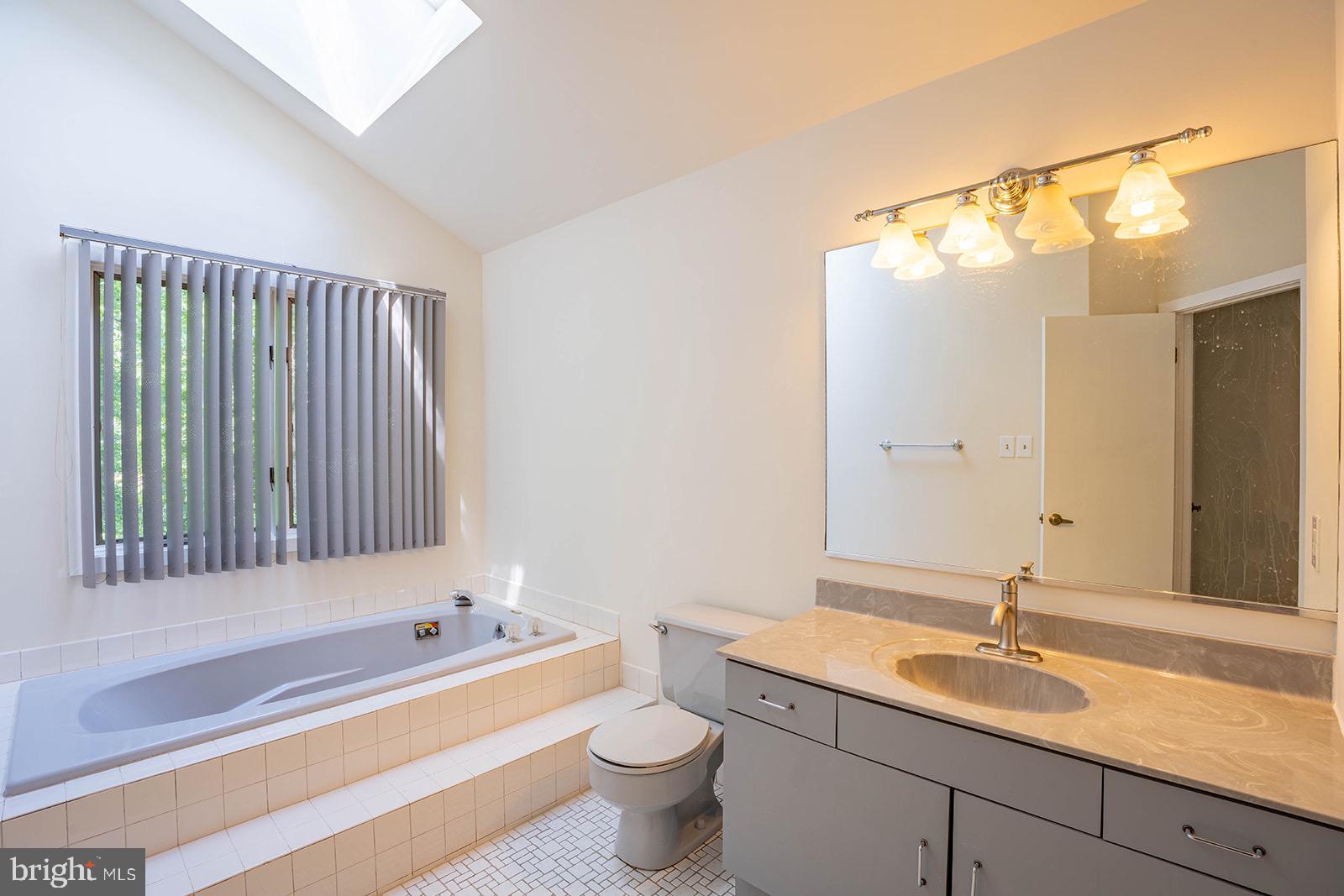 491 Kings Road Yardley, PA 19067 - Photo 41 of 52 a bathroom with a sink and a mirror