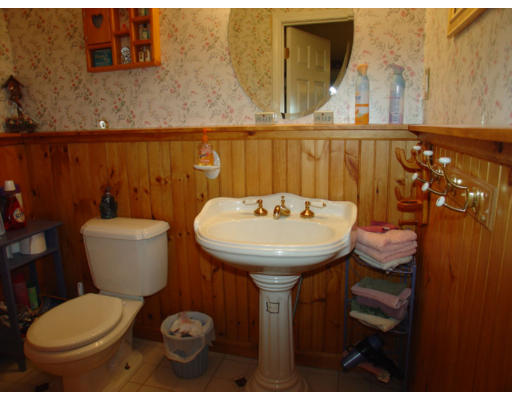 129 Walnut Hill Road Orange, MA 01364 - Photo 15 of 23 a bathroom with a sink and a toilet