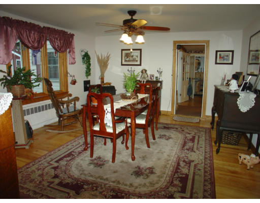 129 Walnut Hill Road Orange, MA 01364 - Photo 4 of 23 a view of a dining room with furniture